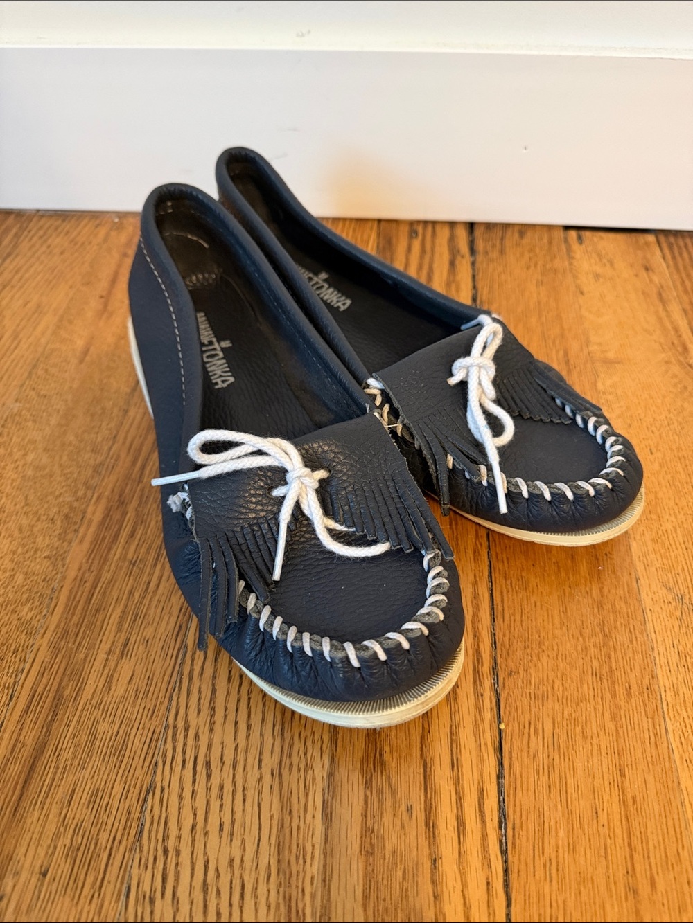 Minnetonka Navy Fringe Moccasin Flats with White Laces